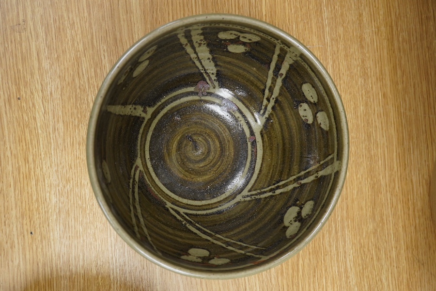 Three studio pottery bowls, one signed ‘A’ to the base, largest 34cm in diameter. Condition - good